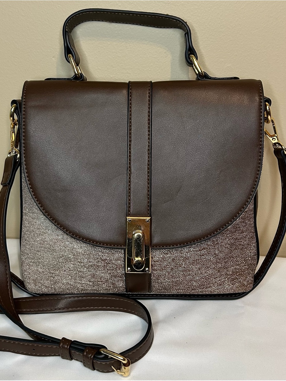 Structured Brown Leather Satchel with Top Handle and Strap